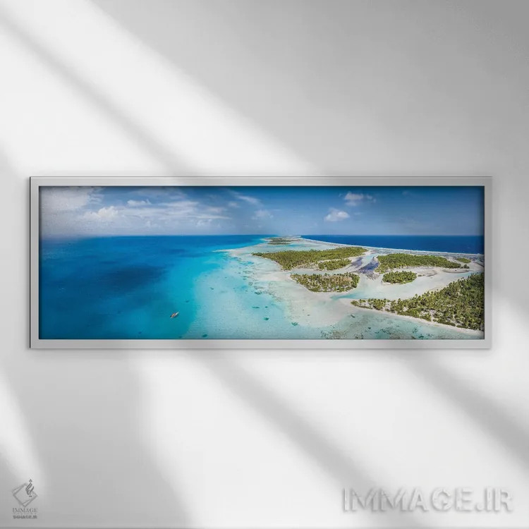 تابلو Tikehau Atoll, French Polynesia,نمای هوایی از تالاب آبی، آتول تیکهائو، پلینزی فرانسه اثر یان بکه - نمای قابدار سفید
