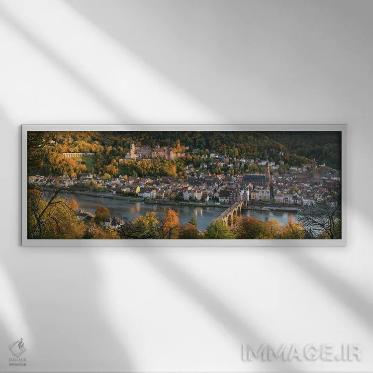 تابلو شهر قدیمی هایدلبرگ در پاییز با نمای قلعه هایدلبرگ و پل قدیمی اثر یان بکه - نمای قابدار سفید
