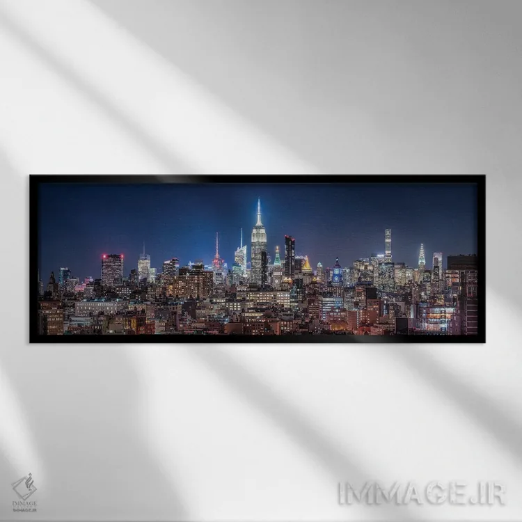 تابلو نمای پانورامی خط آسمان میدنتهن منهتن با ساختمان امپایر استیت در شب اثر یان بکه - نمای قابدار مشکی