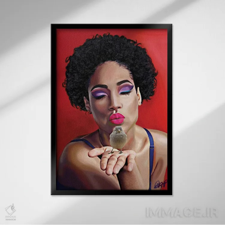 تابلو یک پرنده در دست اثر برندی آدامز-پیفوس - نمای قابدار مشکی