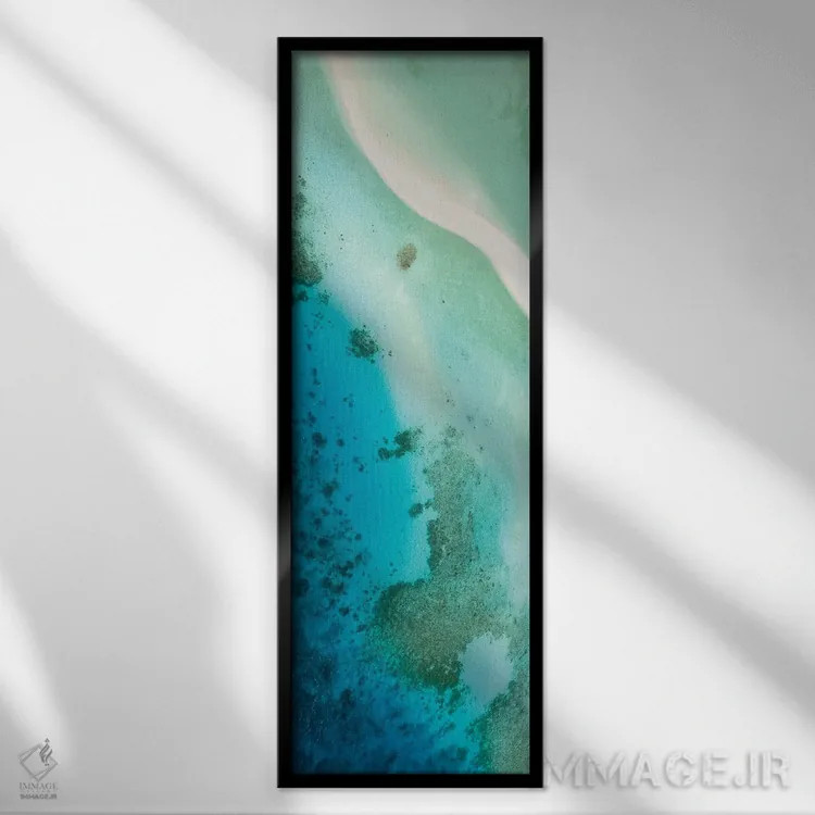 تابلو نمای هوایی از صخرهٔ مرجانی در مالدیو اثر یان بکه - نمای قابدار مشکی