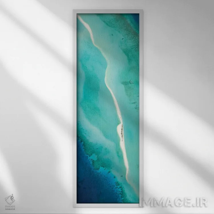 تابلو Indian Ocean, Maldives,پانورامای هوایی از یک تالاب آبی با شنزار، اقیانوس هند، مالدیو اثر یان بکه - نمای قابدار سفید