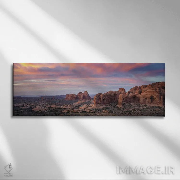 تابلو غروب خورشید بر فراز پارک ملی آرچز اثر عکاسی جاناتان راس - نمای روبهرو روی دیوار