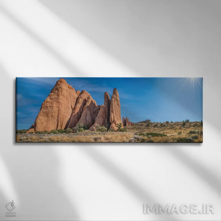 تابلو پارک ملی آرچز با درخشش خورشید اثر عکاسی جاناتان راس - نمای روبهرو روی دیوار