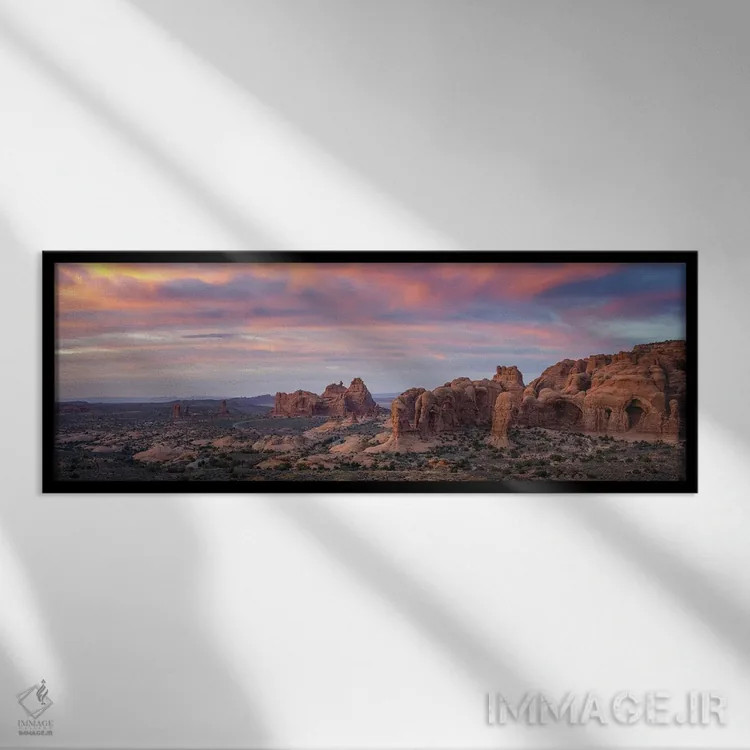 تابلو غروب خورشید بر فراز پارک ملی آرچز اثر عکاسی جاناتان راس - نمای قابدار مشکی