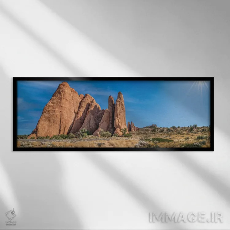 تابلو پارک ملی آرچز با درخشش خورشید اثر عکاسی جاناتان راس - نمای قابدار مشکی