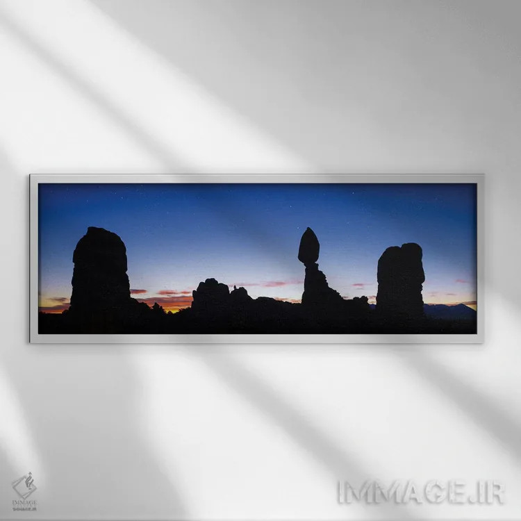 تابلو پانورامای سیلوئت صخره متوازن اثر عکاسی جاناتان راس - نمای قابدار سفید