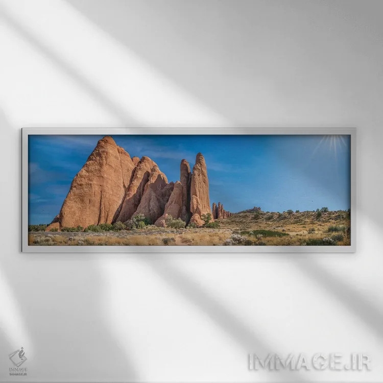 تابلو پارک ملی آرچز با درخشش خورشید اثر عکاسی جاناتان راس - نمای قابدار سفید