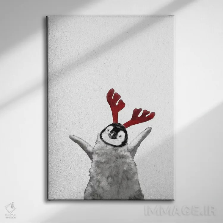 تابلو بچه پنگوئن کریسمسی با شاخ گوزن اثر بگ نوز ورک (استودیو) - نمای روبهرو روی دیوار