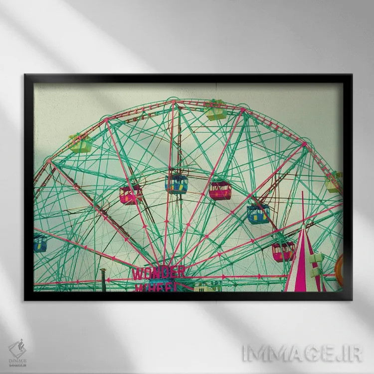 تابلو چرخ شگفتی اثر کارولین مینت - نمای قابدار مشکی