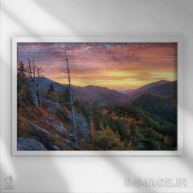 تابلو New York State. Sunrise on Mount Baxter in autumn, Adirondack Mountains.,آمریکا، ایالت نیویورک. طلوع آفتاب پاییزی بر قله باکستر، کوههای آدیرونداک اثر کریس موری - نمای قابدار سفید