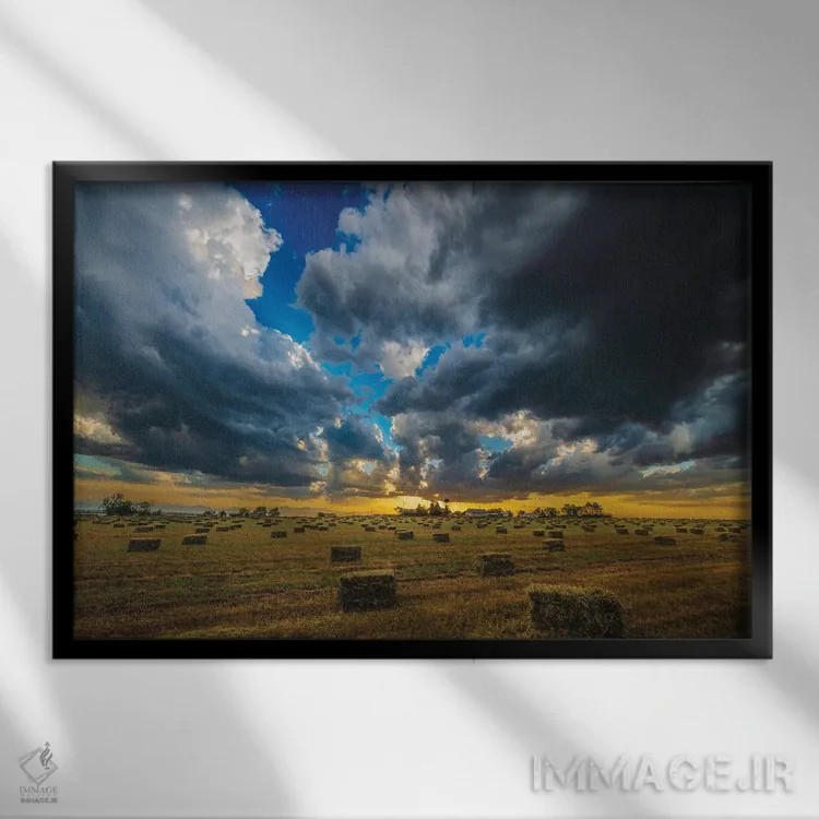 تابلو غروب برداشت یونجه اثر کریستوفر توماس - نمای قابدار مشکی