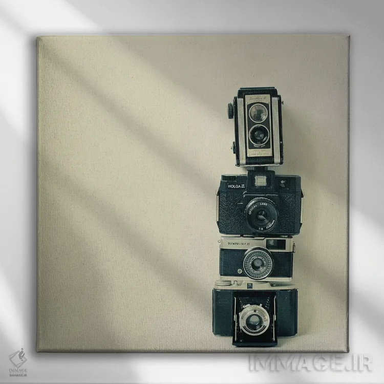 تابلو عشق دوربین اثر کاسیا بک - نمای روبهرو روی دیوار