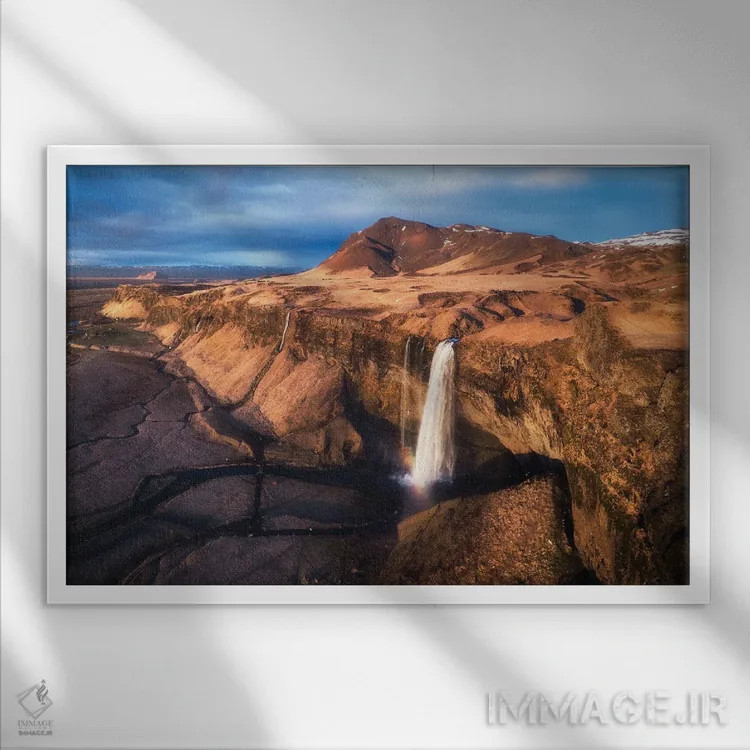 تابلو نمای پانورامای آبشار سلژالاندفوس (ایسلند) اثر دنیل گاستاگر - نمای قابدار سفید