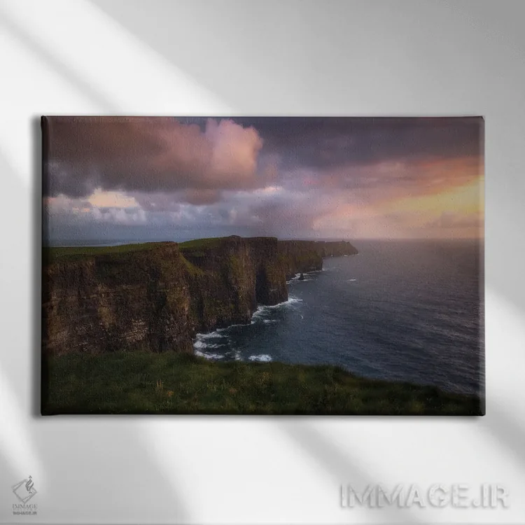تابلو غروب در صخرههای موهر در ایرلند اثر دنیل گاستاگر - نمای روبهرو روی دیوار