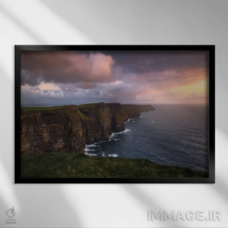 تابلو غروب در صخرههای موهر در ایرلند اثر دنیل گاستاگر - نمای قابدار مشکی