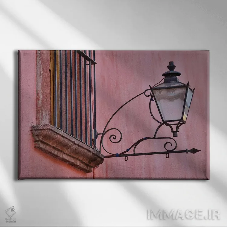 تابلو Mexico. Lantern and shadow on colorful buildings,سن میگوئل د آلنده، مکزیک. فانوس و سایه روی ساختمانهای رنگارنگ اثر دارل گالین - نمای روبهرو روی دیوار