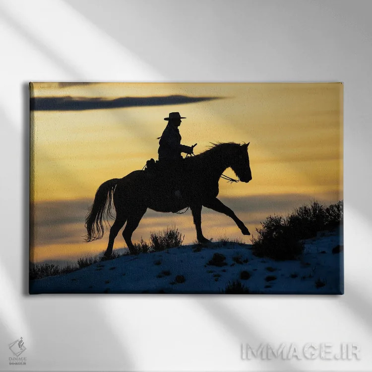تابلو Shell, Wyoming Hideout Ranch Cowgirl Silhouetted On Horseback At Sunset I,آمریکا، شل، وایومینگ، کابوی دختر سیلوئتشده روی اسب هنگام غروب ۱ اثر دارل گالین - نمای روبهرو روی دیوار