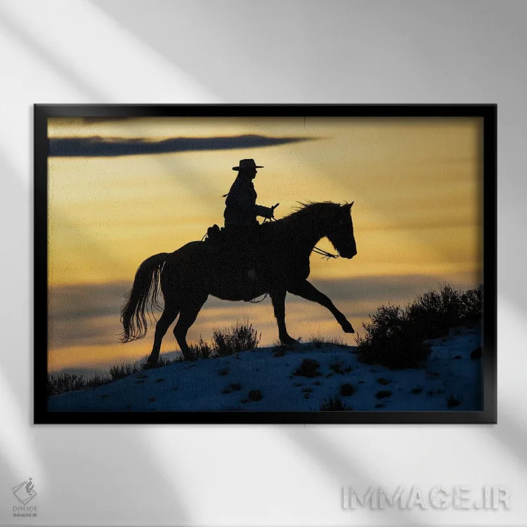 تابلو Shell, Wyoming Hideout Ranch Cowgirl Silhouetted On Horseback At Sunset I,آمریکا، شل، وایومینگ، کابوی دختر سیلوئتشده روی اسب هنگام غروب ۱ اثر دارل گالین - نمای قابدار مشکی