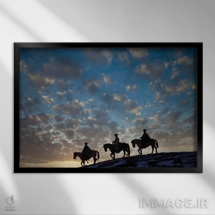 تابلو Shell, Wyoming Hideout Ranch Cowboys And Cowgirls Silhouetted Against Sunset Riding On Ridgeline I,آمریکا، شل، وایومینگ، کابویها و کابوی دختران در حال سواری سیلوئتشده مقابل غروب بر خطالرأس ۱ اثر دارل گالین - نمای قابدار مشکی