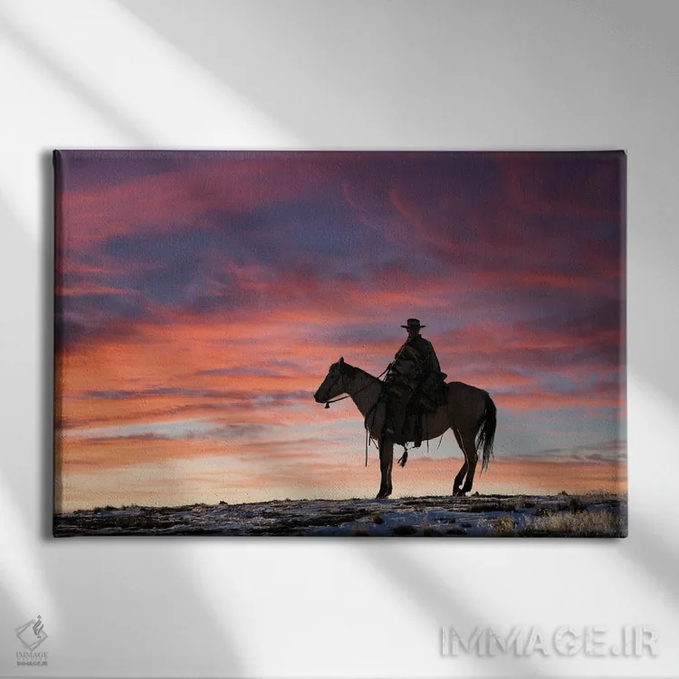 تابلو Shell, Wyoming Hideout Ranch Cowgirl Silhouetted On Horseback At Sunset II,آمریکا، شل، وایومینگ، کابوی دختر سیلوئتشده روی اسب هنگام غروب ۲ اثر دارل گالین - نمای روبهرو روی دیوار