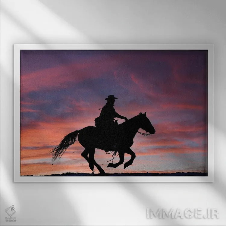 تابلو Shell, Wyoming Hideout Ranch Cowgirl Silhouetted On Horseback At Sunset III,آمریکا، شل، وایومینگ، کابوی دختر سیلوئتشده روی اسب هنگام غروب ۳ اثر دارل گالین - نمای قابدار سفید