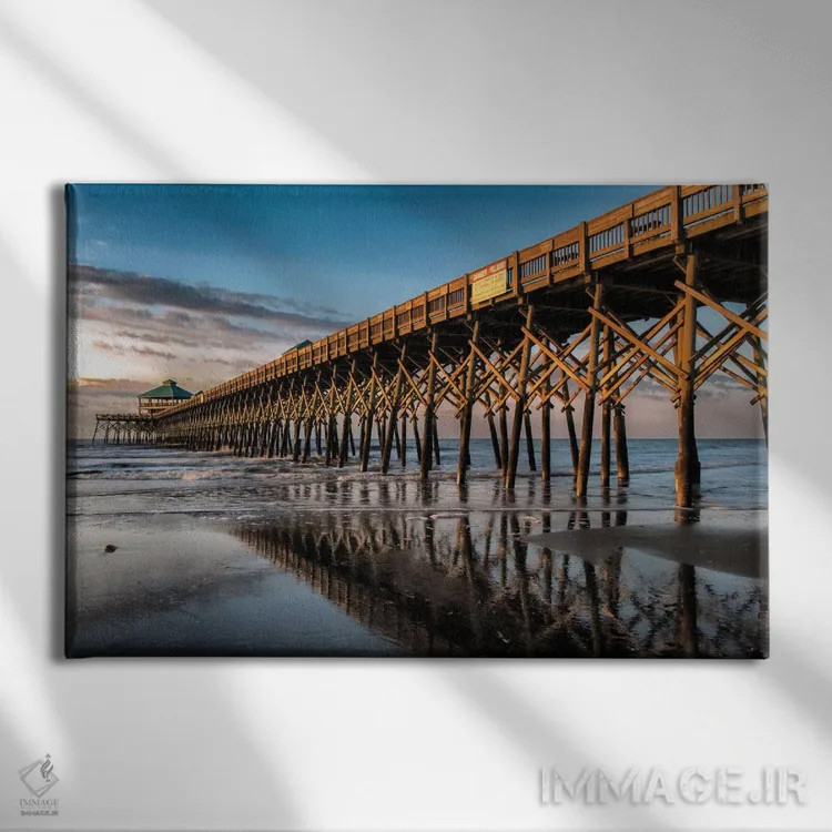 تابلو آفتاب گرفتن در ساحل فالی اثر دنی هد - نمای روبهرو روی دیوار