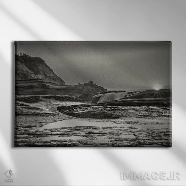 تابلو غروب بر فراز صخرههای اقیانوس اثر دان شوارتز - نمای روبهرو روی دیوار