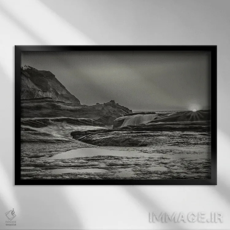 تابلو غروب بر فراز صخرههای اقیانوس اثر دان شوارتز - نمای قابدار مشکی