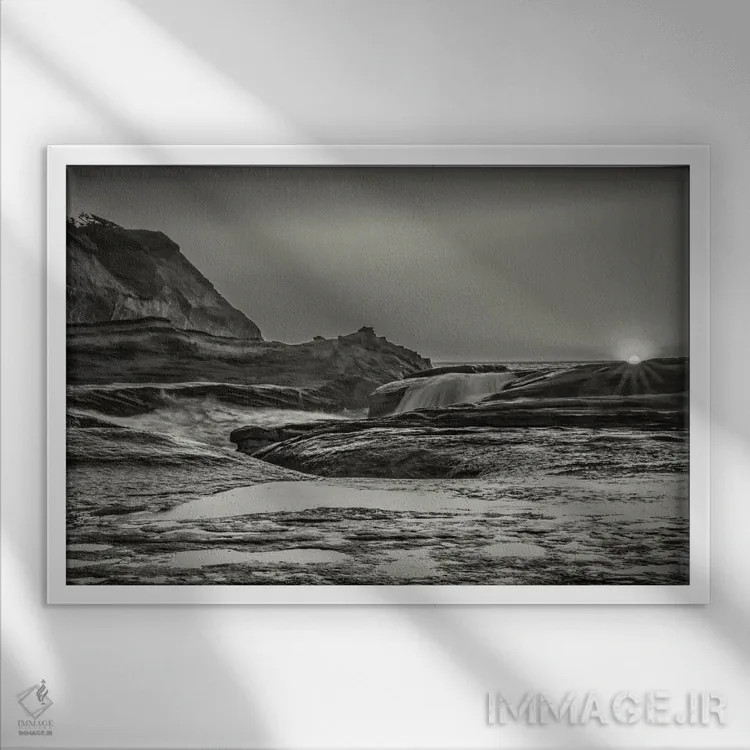 تابلو غروب بر فراز صخرههای اقیانوس اثر دان شوارتز - نمای قابدار سفید