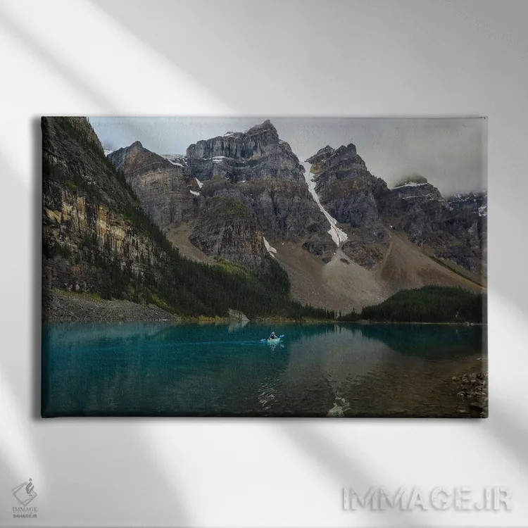 تابلو قایقران کایاک دریاچه مورن اثر دن اسپرول - نمای روبهرو روی دیوار
