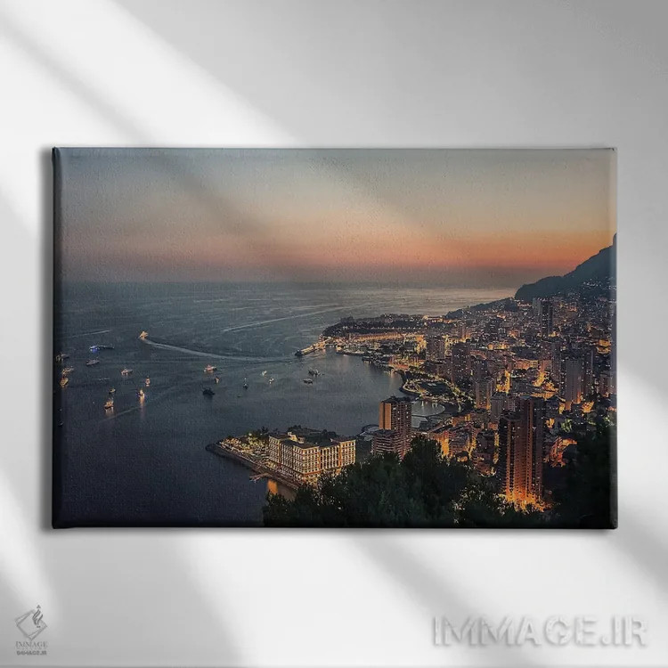 تابلو غروب در موناکو اثر مانجیک پیکچرز (استودیو عکاسی یا فیلمسازی) - نمای روبهرو روی دیوار