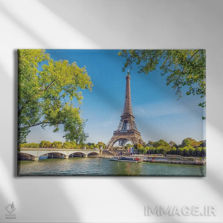 تابلو برج ایفل اثر مانجیک پیکچرز (استودیو عکاسی یا فیلمسازی) - نمای روبهرو روی دیوار