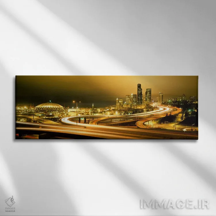 تابلو ساختمانها روشن شده در شب، سیاتل، ایالت واشنگتن، ایالات متحده آمریکا اثر پانورامیک ایمجز (استودیو عکاسی عریض) - نمای روبهرو روی دیوار