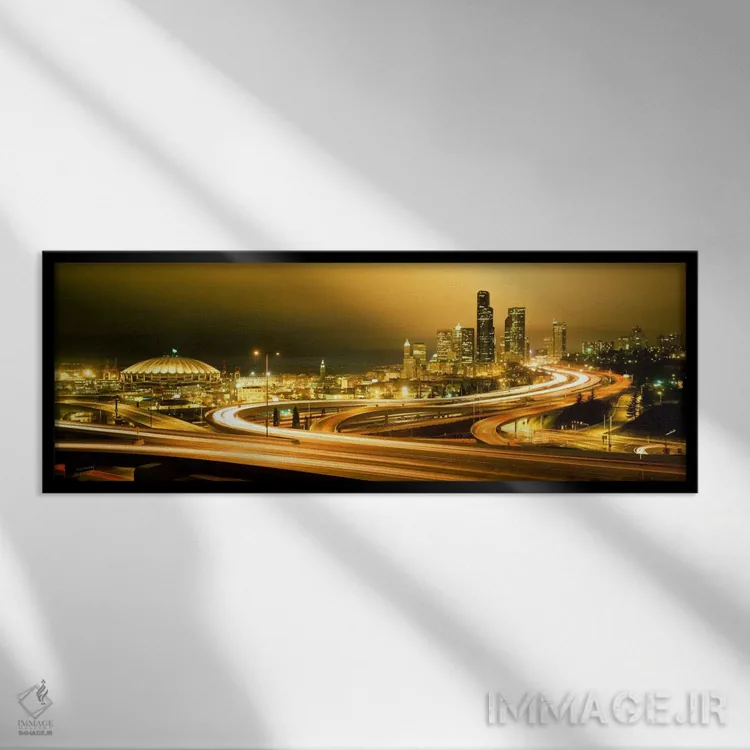 تابلو ساختمانها روشن شده در شب، سیاتل، ایالت واشنگتن، ایالات متحده آمریکا اثر پانورامیک ایمجز (استودیو عکاسی عریض) - نمای قابدار مشکی