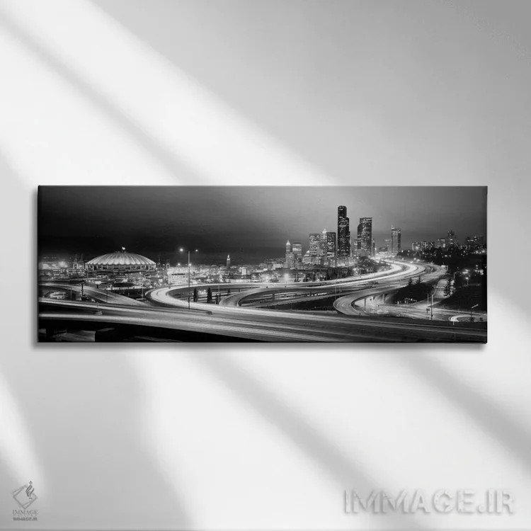 تابلو ساختمانها روشن شده در شب، سیاتل، ایالت واشنگتن، ایالات متحده آمریکا (سیاه و سفید) اثر پانورامیک ایمجز (استودیو عکاسی عریض) - نمای روبهرو روی دیوار