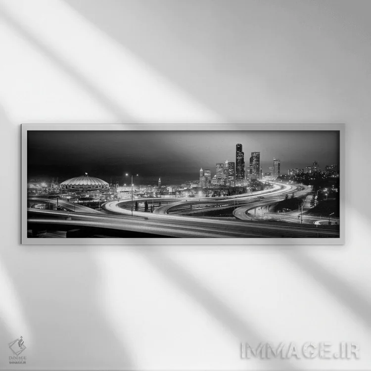 تابلو ساختمانها روشن شده در شب، سیاتل، ایالت واشنگتن، ایالات متحده آمریکا (سیاه و سفید) اثر پانورامیک ایمجز (استودیو عکاسی عریض) - نمای قابدار سفید