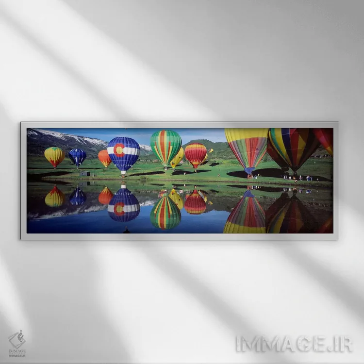 تابلو بازتاب بالنهای هوای داغ روی آب، کلرادو، ایالات متحده آمریکا اثر پانورامیک ایمجز (استودیو عکاسی عریض) - نمای قابدار سفید