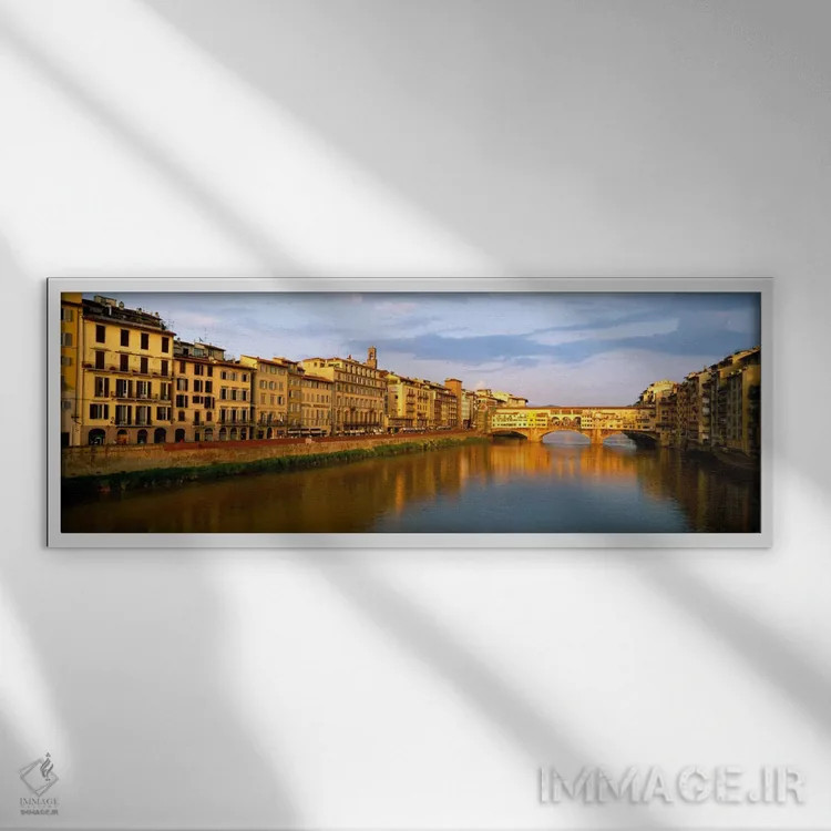 تابلو Arno River, Florence, Tuscany, Italy" - "معماری کنار رودخانه و پل وکیو، رودخانه آرنو، فلورانس، توسکانی، ایتالیا" اثر پانورامیک ایمجز (استودیو عکاسی عریض) - نمای قابدار سفید