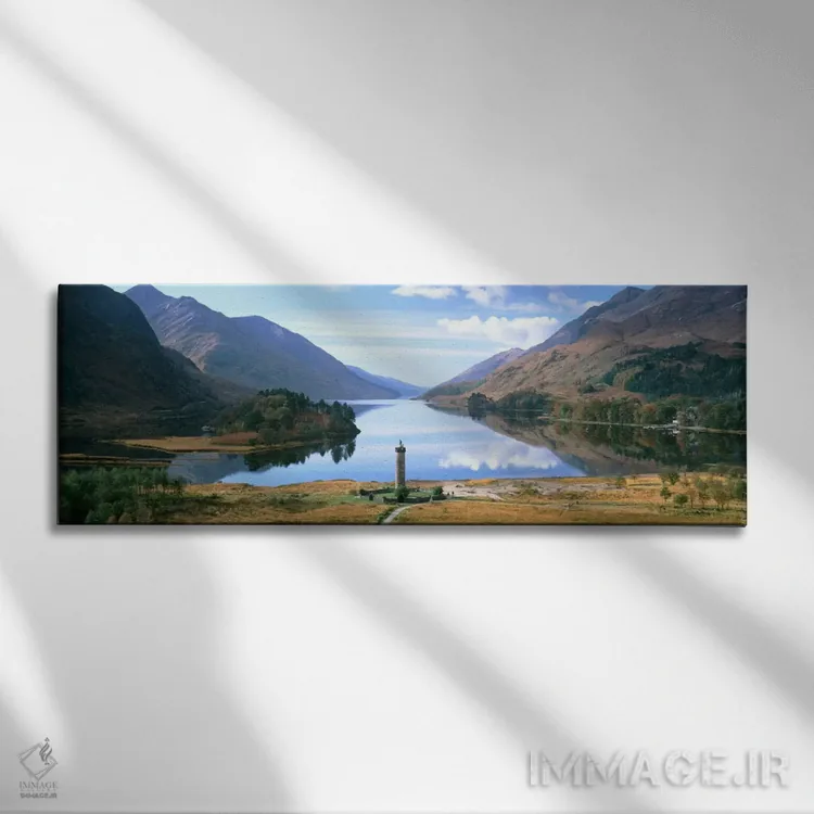 تابلو Glenfinnan, Highlands, Scotland, United Kingdom" - "چشمانداز زیبا با برج یادبود گلنفینان و دریاچه شییل، گلنفینان، هایلند، اسکاتلند، بریتانیا" اثر پانورامیک ایمجز (استودیو عکاسی عریض) - نمای روبهرو روی دیوار