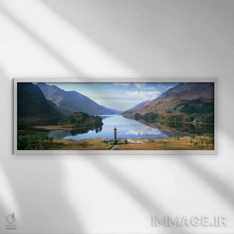 تابلو Glenfinnan, Highlands, Scotland, United Kingdom" - "چشمانداز زیبا با برج یادبود گلنفینان و دریاچه شییل، گلنفینان، هایلند، اسکاتلند، بریتانیا" اثر پانورامیک ایمجز (استودیو عکاسی عریض) - نمای قابدار سفید