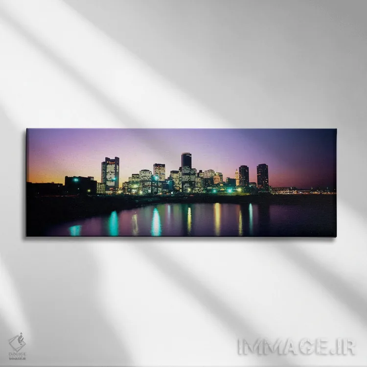 تابلو ساختمانهایی که در غروب روشن شدهاند، بوستون، شهرستان سافوک، ماساچوست، ایالات متحده آمریکا اثر پانورامیک ایمجز (استودیو عکاسی عریض) - نمای روبهرو روی دیوار