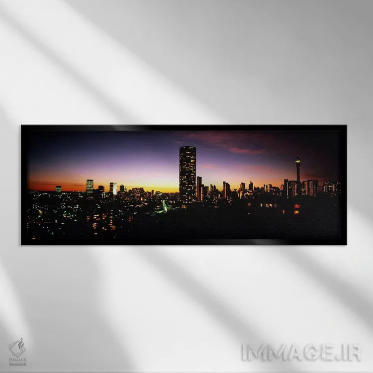تابلو نمای آسمانشهر مرکز شهر در غروب، ژوهانسبورگ، گائوتنگ، آفریقای جنوبی اثر پانورامیک ایمجز (استودیو عکاسی عریض) - نمای قابدار مشکی