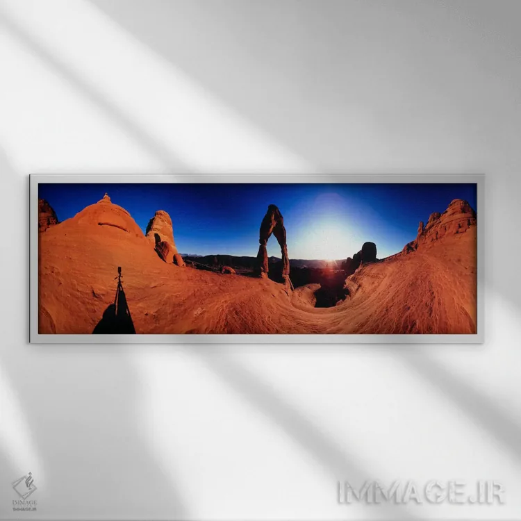 تابلو قوس نازک در طلوع آفتاب، پارک ملی قوسها، یوتا، ایالات متحده آمریکا اثر پانورامیک ایمجز (استودیو عکاسی عریض) - نمای قابدار سفید