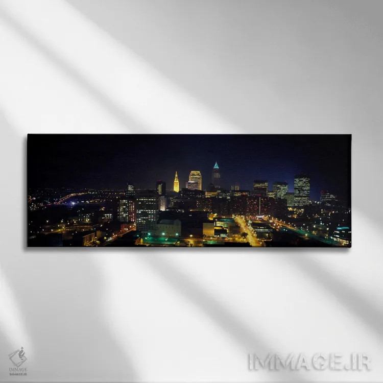 تابلو Ohio, USA" - "نمای هوایی از یک شهر که در شب روشن شده، کلیولند، اوهایو، ایالات متحده" اثر پانورامیک ایمجز (استودیو عکاسی عریض) - نمای روبهرو روی دیوار