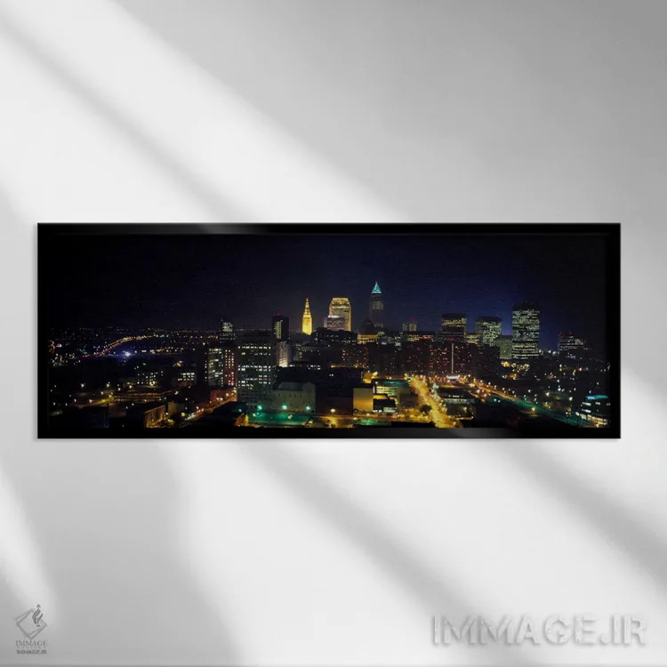 تابلو Ohio, USA" - "نمای هوایی از یک شهر که در شب روشن شده، کلیولند، اوهایو، ایالات متحده" اثر پانورامیک ایمجز (استودیو عکاسی عریض) - نمای قابدار مشکی