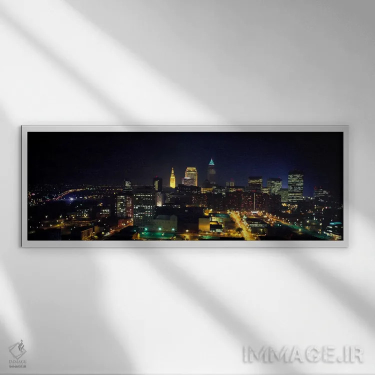 تابلو Ohio, USA" - "نمای هوایی از یک شهر که در شب روشن شده، کلیولند، اوهایو، ایالات متحده" اثر پانورامیک ایمجز (استودیو عکاسی عریض) - نمای قابدار سفید