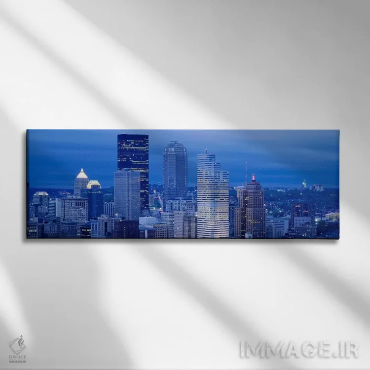 تابلو Pennsylvania, USA,نمای زاویهبالا از آسمانخراشهای روشنشده در غروب، پیتسبورگ، پنسیلوانیا، آمریکا اثر پانورامیک ایمجز (استودیو عکاسی عریض) - نمای روبهرو روی دیوار