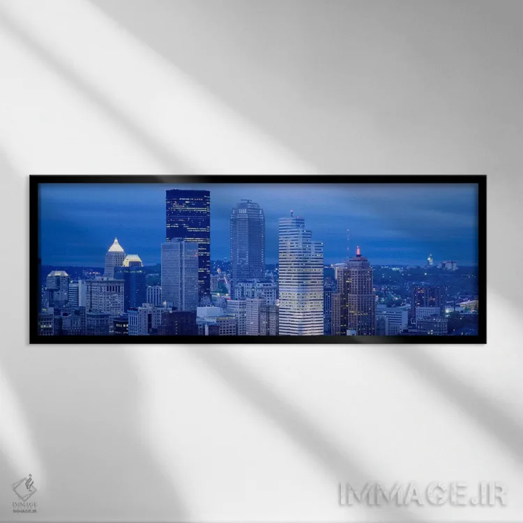 تابلو Pennsylvania, USA,نمای زاویهبالا از آسمانخراشهای روشنشده در غروب، پیتسبورگ، پنسیلوانیا، آمریکا اثر پانورامیک ایمجز (استودیو عکاسی عریض) - نمای قابدار مشکی
