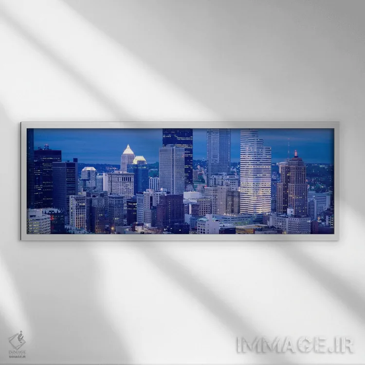 تابلو Pittsburgh, Pennsylvania, USA" - "ساختمانها در یک شهر که در غروب روشن شدهاند، پیتسبورگ، پنسیلوانیا، ایالات متحده" اثر پانورامیک ایمجز (استودیو عکاسی عریض) - نمای قابدار سفید